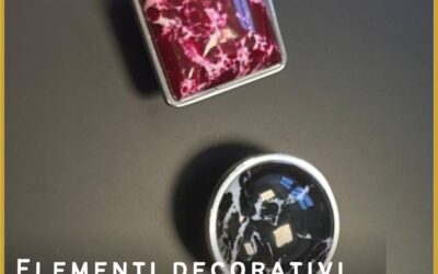 elementi decorativi metallo e materiale ricostituito